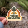Amanda Weedmark Tree Hugger Vinyl Sticker Home Page